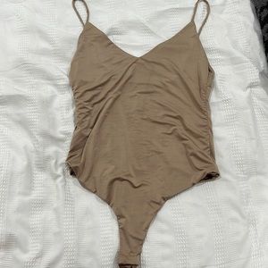 Size large nude body suit!